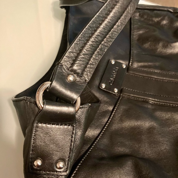 Calvin Klein Smooth Black Napa Leather Shoulder Purse with Silver Satin Lining. - Picture 9 of 10